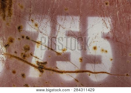 Number Seven Hundred And Fifty Five Painted On Rusty Red Metal, Number 755