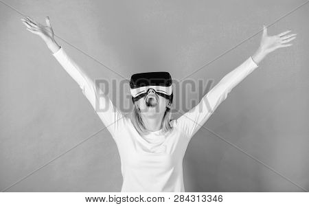 3d Technology, Virtual Reality, Entertainment, Cyberspace And People Concept. Happy Woman Exploring 