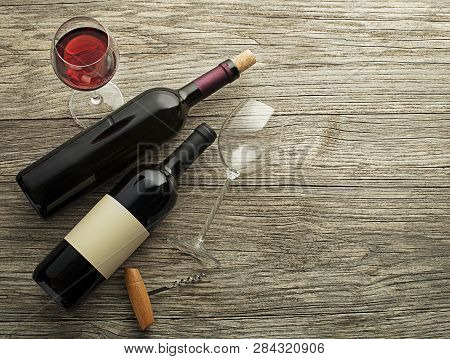 Glass And Bottle Of Red Wine On Wooden Background. Wine Bottle Mockup. Top View