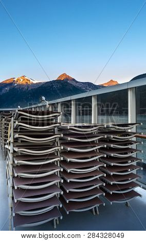 Stacked Flat Lounge Crusie Ship Deck, Morning, Sunlight On Mountains, Alaska.