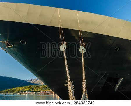 Mooring Lines With Rat Guards From Bow Of Cruise Ship, Berthed At An Alaskan Deepwater Terminal, On 