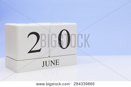 June 20st. Day 20 Of Month, Daily Calendar On White Table With Reflection, With Light Blue Backgroun