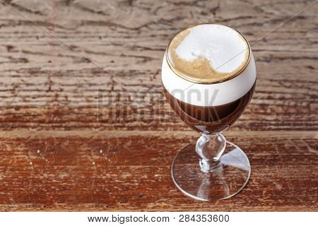 Viennese Coffee On The Bar In The Cafe. Invigorating Drink Based On Coffee, With Foam From Cream