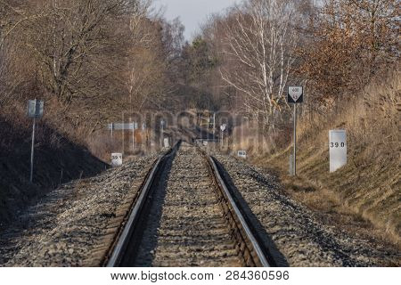 Orange Railway Near Luznice Station In Sunny Hot Winter Day