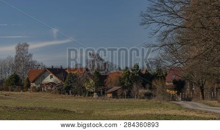 New Houses In Luznice Village Near Rozmberk Pond In Winter Sunny Day
