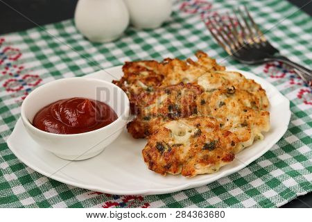 Homemade Chicken Patties. Chicken Fillet Is Fried And Served With Tomato Sauce
