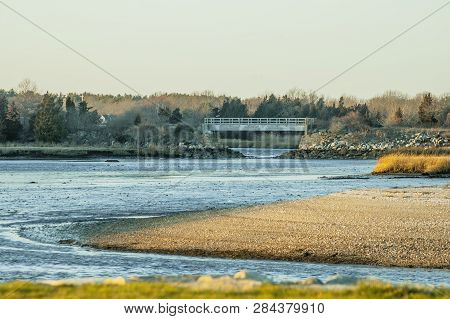 Mudflats At Low Tide Below Footbridge Crossing The Mattapoisett River Near Its Mouth.