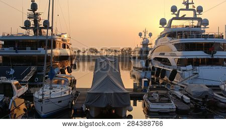 Tuen Mun, Hong Kong 01 February 2019:- Typhoon shelter in Gold coast at Hong Kong under sunset