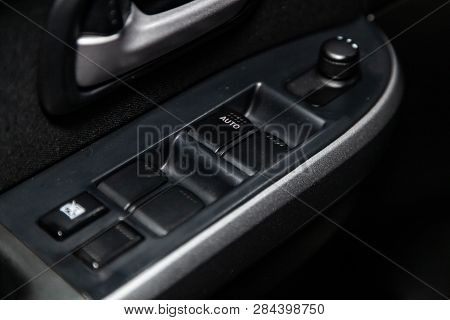 Novosibirsk, Russia - February 15, 2019: Suzuki Grand Vitara,close-up Of The Side Door Buttons: Wind