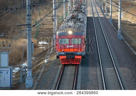 Ulyanovka, Russia - April 10, 2018: Top View Of The Approaching Suburban Electric Train Et2m-067