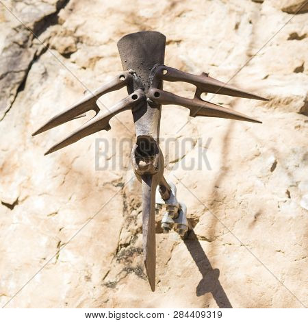 An Old Agricoltural Tool In A Composition