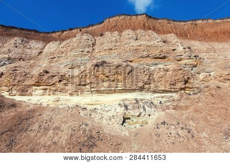 Rockslide. Mountain Landslide In An Environmentally Hazardous Area. Large Cracks In Earth, Descent O