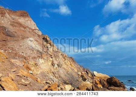 Rockslide. Mountain Landslide In An Environmentally Hazardous Area. Large Cracks In Earth, Descent O