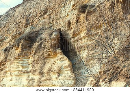 Rockslide. Mountain Landslide In An Environmentally Hazardous Area. Large Cracks In Earth, Descent O