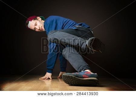 Attractive Male Street Dancer Perform Break Dance Footwork