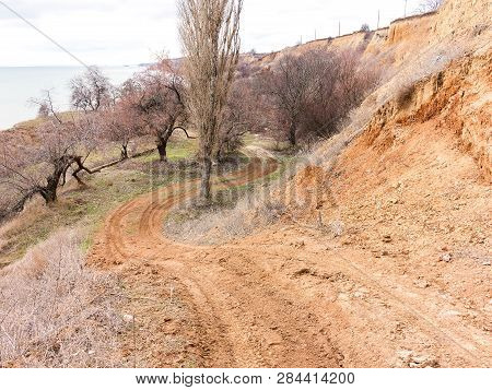 Rockslide. Mountain Landslide In An Environmentally Hazardous Area. Large Cracks In Earth, Descent O