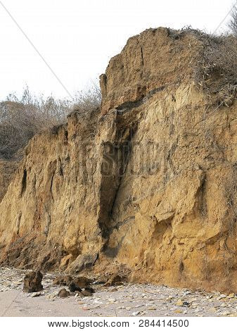 Rockslide. Mountain Landslide In An Environmentally Hazardous Area. Large Cracks In Earth, Descent O