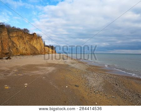 Rockslide. Mountain Landslide In An Environmentally Hazardous Area. Large Cracks In Earth, Descent O