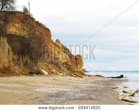 Rockslide. Mountain Landslide In An Environmentally Hazardous Area. Large Cracks In Earth, Descent O