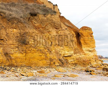 Rockslide. Mountain Landslide In An Environmentally Hazardous Area. Large Cracks In Earth, Descent O