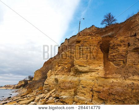 Rockslide. Mountain Landslide In An Environmentally Hazardous Area. Large Cracks In Earth, Descent O