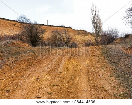 Rockslide. Mountain Landslide In An Environmentally Hazardous Area. Large Cracks In Earth, Descent O