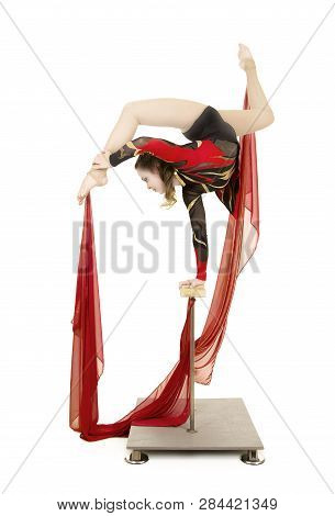 Flexible Equilibrist Performs Exercises On Acrobatic Walking Sticks.