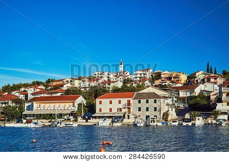 Boats And Sailboats In The Marina In The City Of Seget Vranjica In Croatia