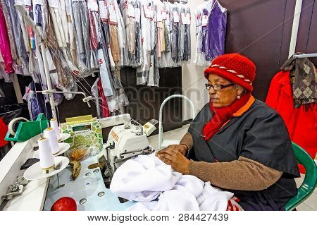 Inside Interior Of A  Dry Cleaners In A Mall