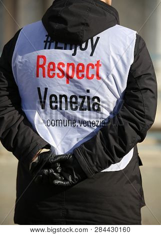 Guard Security Staff With Jacket And The Text Enjoy Respect Venezia In Venice In Italy