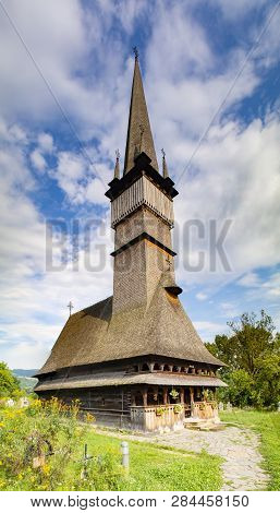 Maramures, Romania - August 1st, 2018: A Typical Example Of The Famous Wooden Churches Of The Maramu