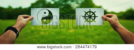 Religion Conflicts As Global Issue Concept. Two Hands Holding Different Faith Symbols Of China, Budd