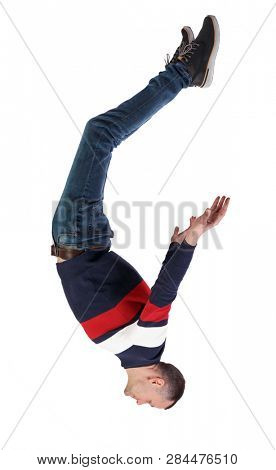 Side view of man in zero gravity or a fall. guy is flying, falling or floating in the air. Side view people collection.  side view of person.  Isolated over white. guy in the jacket hangs upside down.