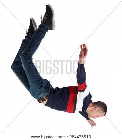 Side view of man in zero gravity or a fall. guy is flying, falling or floating in the air. Side view people collection.  Isolated over white background. The guy in the jacket falls down
