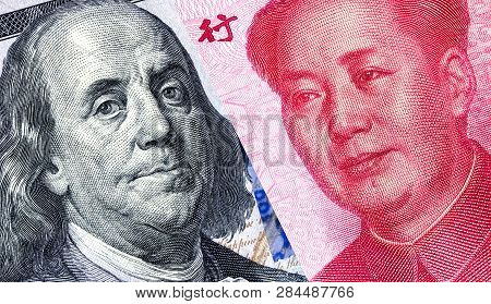 Portrait Of Benjamin Franklin Against Mao Zedong, 100 Us Dollars And 100 Chinese Yuan