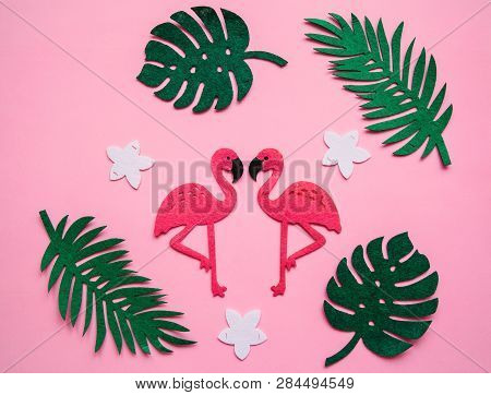 Flamingos And Leaves On A Pink Background. Summer Design.