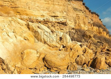 Rockslide. Mountain Landslide In An Environmentally Hazardous Area. Large Cracks In Earth, Descent O