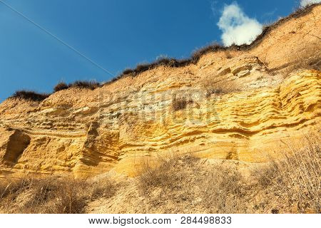 Rockslide. Mountain Landslide In An Environmentally Hazardous Area. Large Cracks In Earth, Descent O