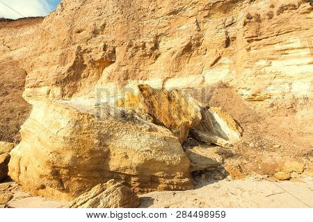 Rockslide. Mountain Landslide In An Environmentally Hazardous Area. Large Cracks In Earth, Descent O