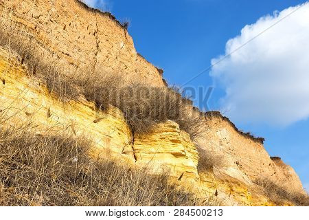 Rockslide. Mountain Landslide In An Environmentally Hazardous Area. Large Cracks In Earth, Descent O