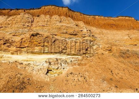 Rockslide. Mountain Landslide In An Environmentally Hazardous Area. Large Cracks In Earth, Descent O