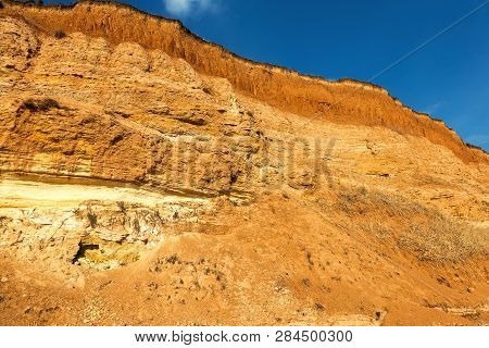 Rockslide. Mountain Landslide In An Environmentally Hazardous Area. Large Cracks In Earth, Descent O