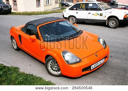 Bakal, Russia - August 13, 2010: Orange Motor Car Toyota Mr-2 In The City Street.