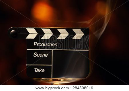 Clapperboard Smoke Gold Bokeh Studio Quality Light