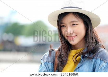 Young Asian Woman Portrait Smiling With Happiness At City Outdoors Background, Casual Lifesyle, Trav