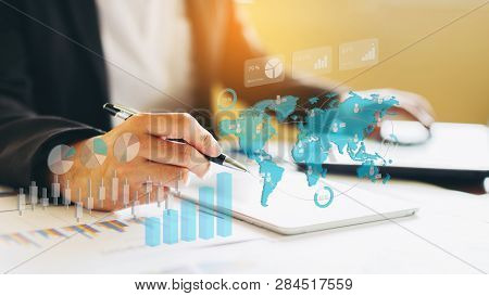 Businessman Investment Consultant Analyzing Company Financial Report Balance Sheet Statement Working