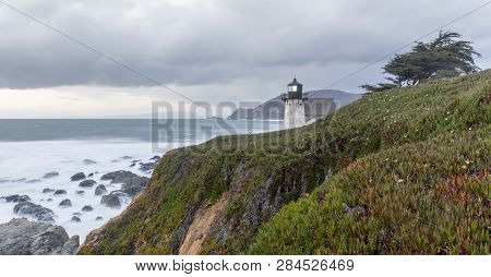 Point Montara Lighthouse And The Pacific Ocean Coastline On A Winter Evening. Montara, San Mateo Cou