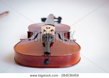 violin with bow in white background or viola in white background