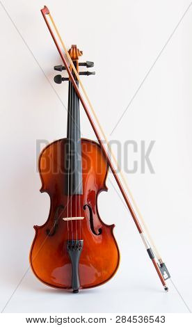 Violin with bow in white background or fiddle in white background