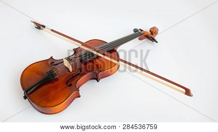 Violin with bow in white background or fiddle in white background